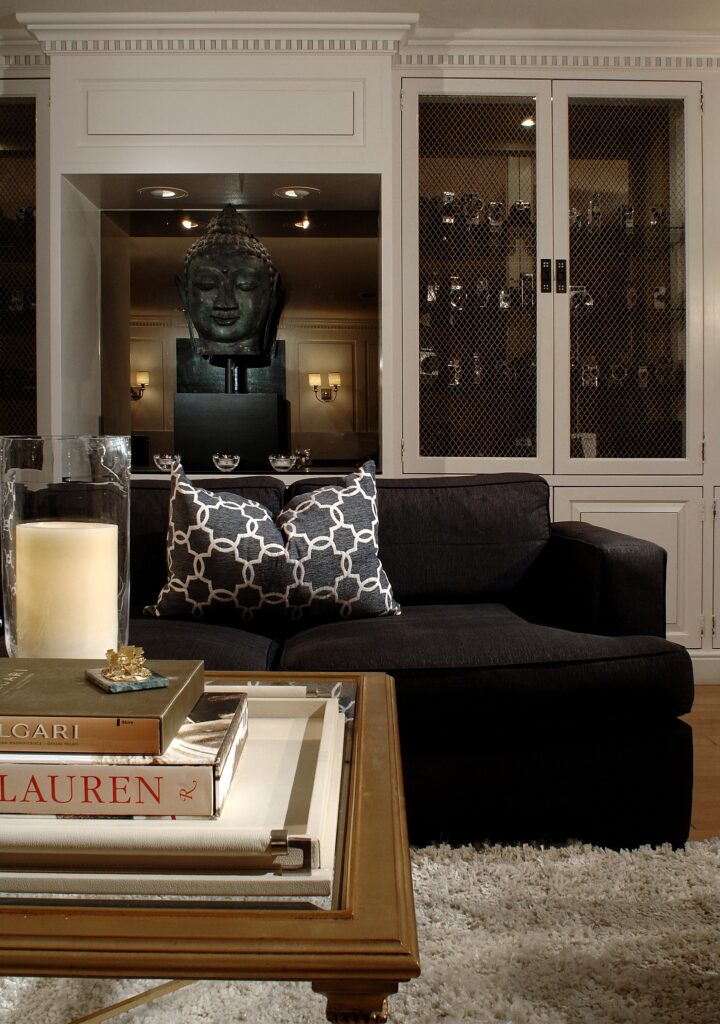 Living room detail with sculptural seating and layered textiles